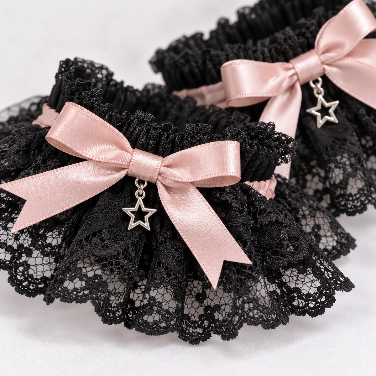 Close-up of lace, satin bows, and star accents on the Harajuku wrist cuffs