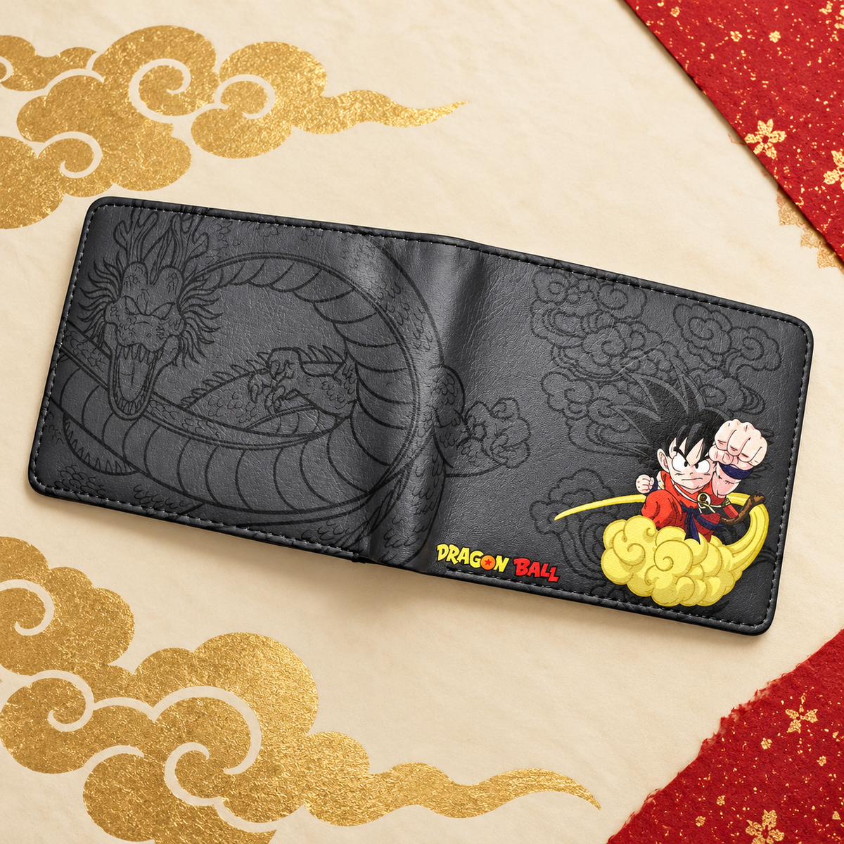 Open Goku Nimbus wallet showing the dragon embossing on an ivory surface
