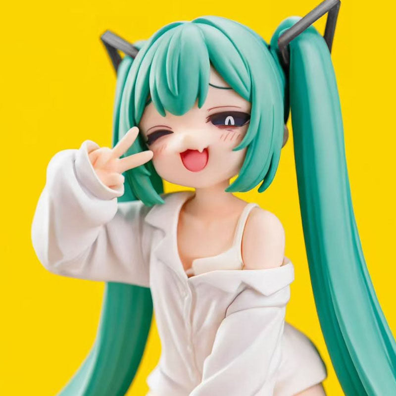 Ahegao Hatsune Miku Figure close-up on yellow background