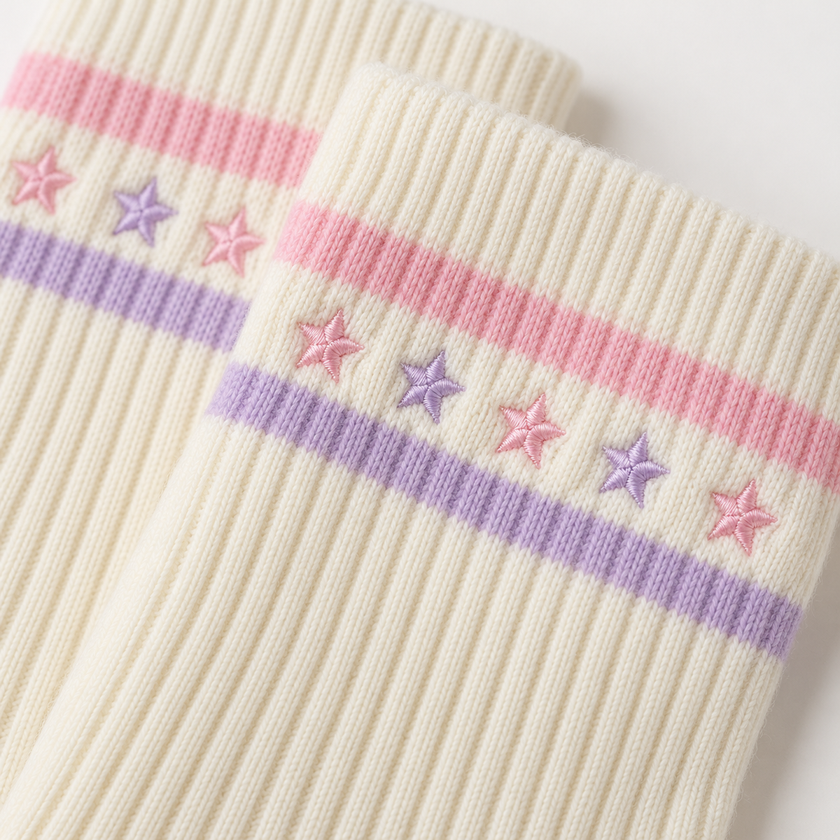Close-up of the ribbed knit and embroidered stars on pastel Harajuku knee socks