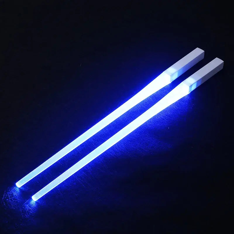 Palillos Jedi con sable de luz LED