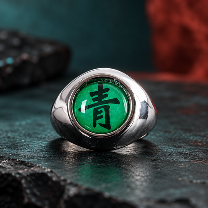 Deidara Ao Akatsuki ring with emerald-green 青 face in a teal studio