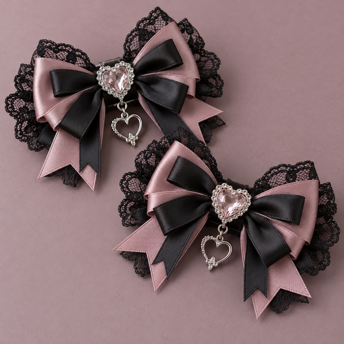 Two ornate dusty rose and black Jirai Kei hair clips