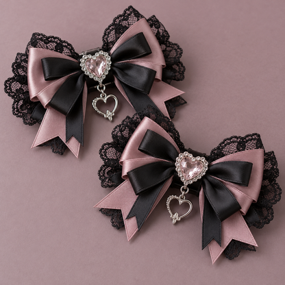 Two ornate dusty rose and black Jirai Kei hair clips