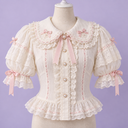Ivory Harajuku blouse with lace collar, puff sleeves, and blush ribbon details
