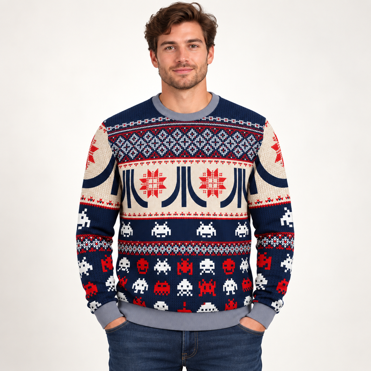 Model wearing the navy and cream Atari Christmas sweater with pixel alien design
