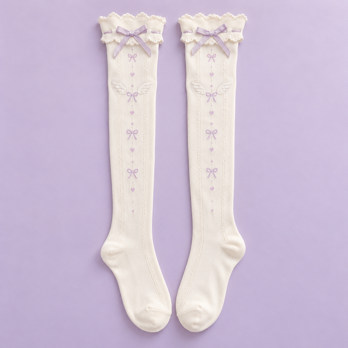 Pair of ivory Tenshi Kawaii over-the-knee socks with lavender bows