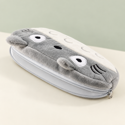 Side angle of Totoro plush pencil case showing zipper