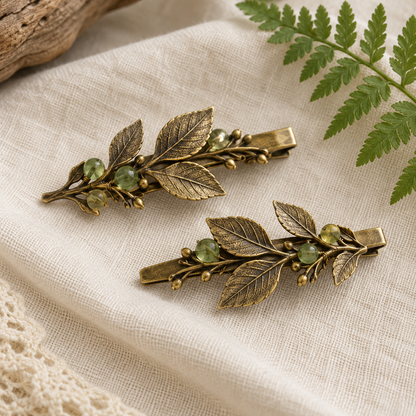 Pair of antique brass fern hair clips with green accents