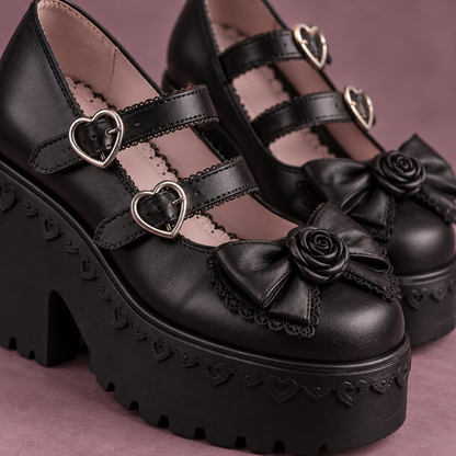 Close-up of Jirai Kei platform shoe heart buckles and bow