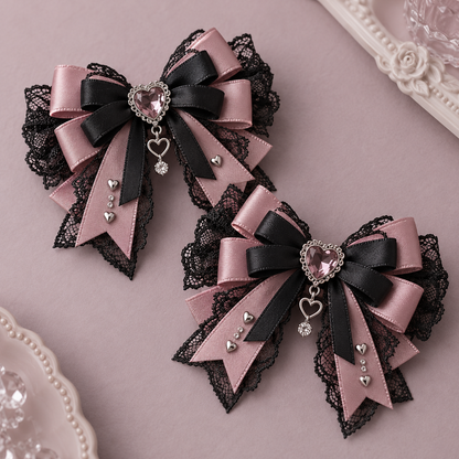 Pair of black and dusty rose Jirai Kei lace hair bows with heart charms