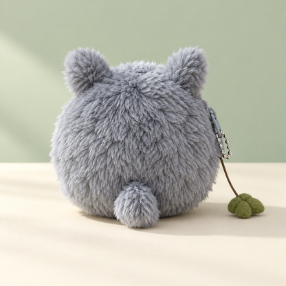 Back of gray Totoro plush keychain wallet with leaf charm