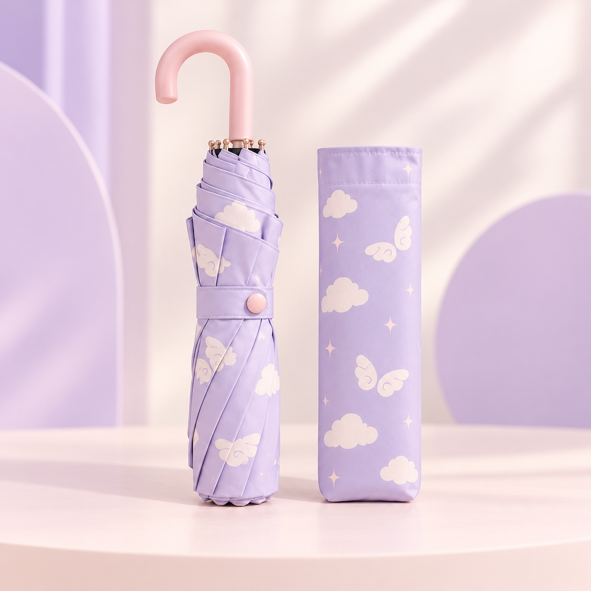 Folded lavender wing pattern umbrella with matching carrying sleeve