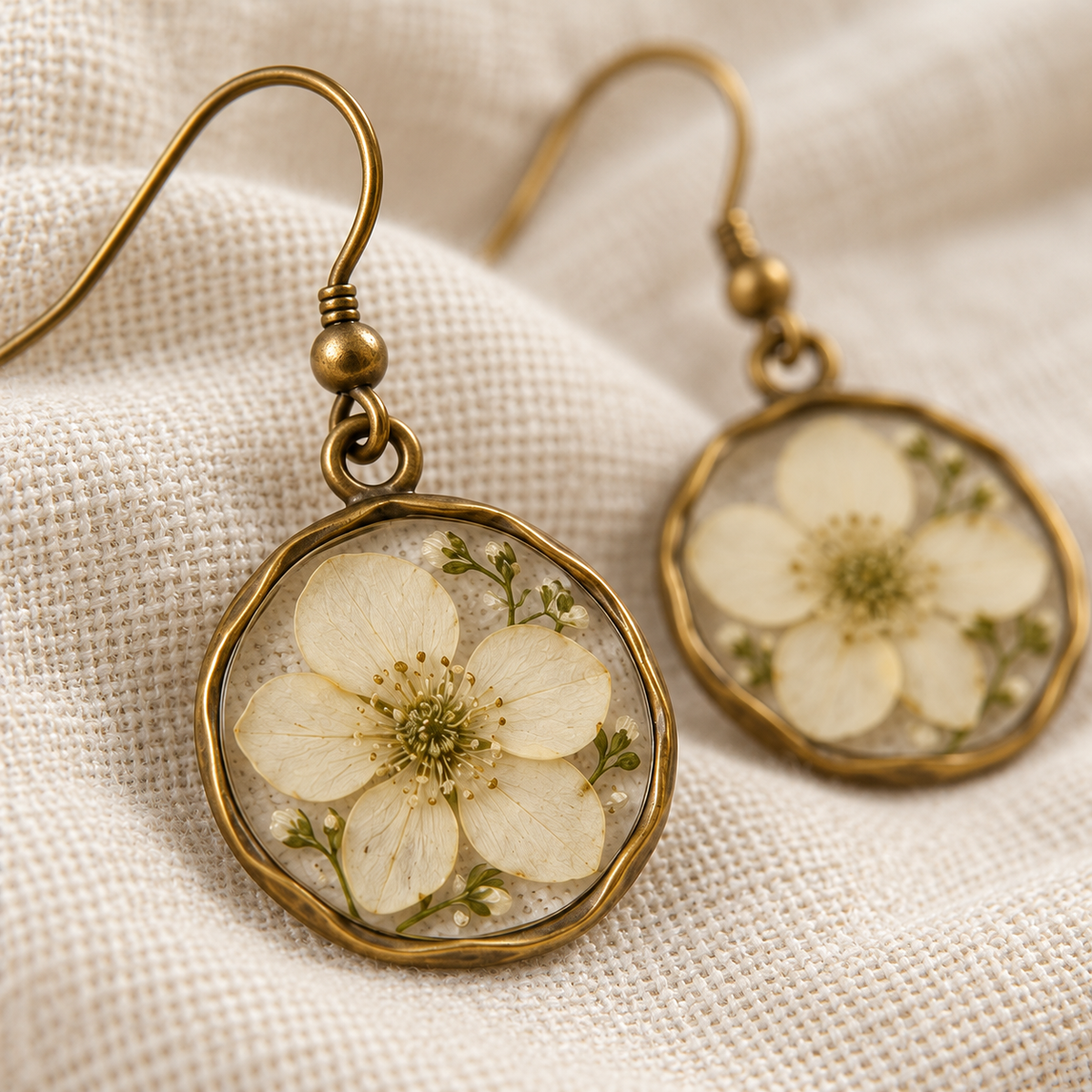 Close detail of cream floral Mori Kei dangle earring