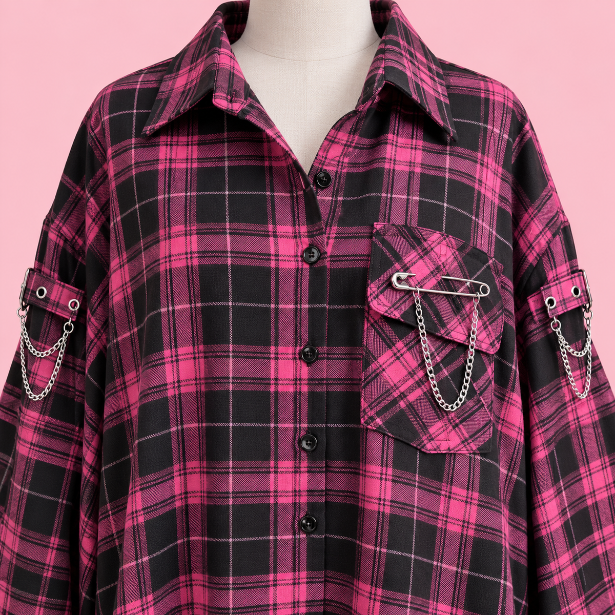 Close-up of plaid weave, pocket, pins, and chains on the Gyaru shirt
