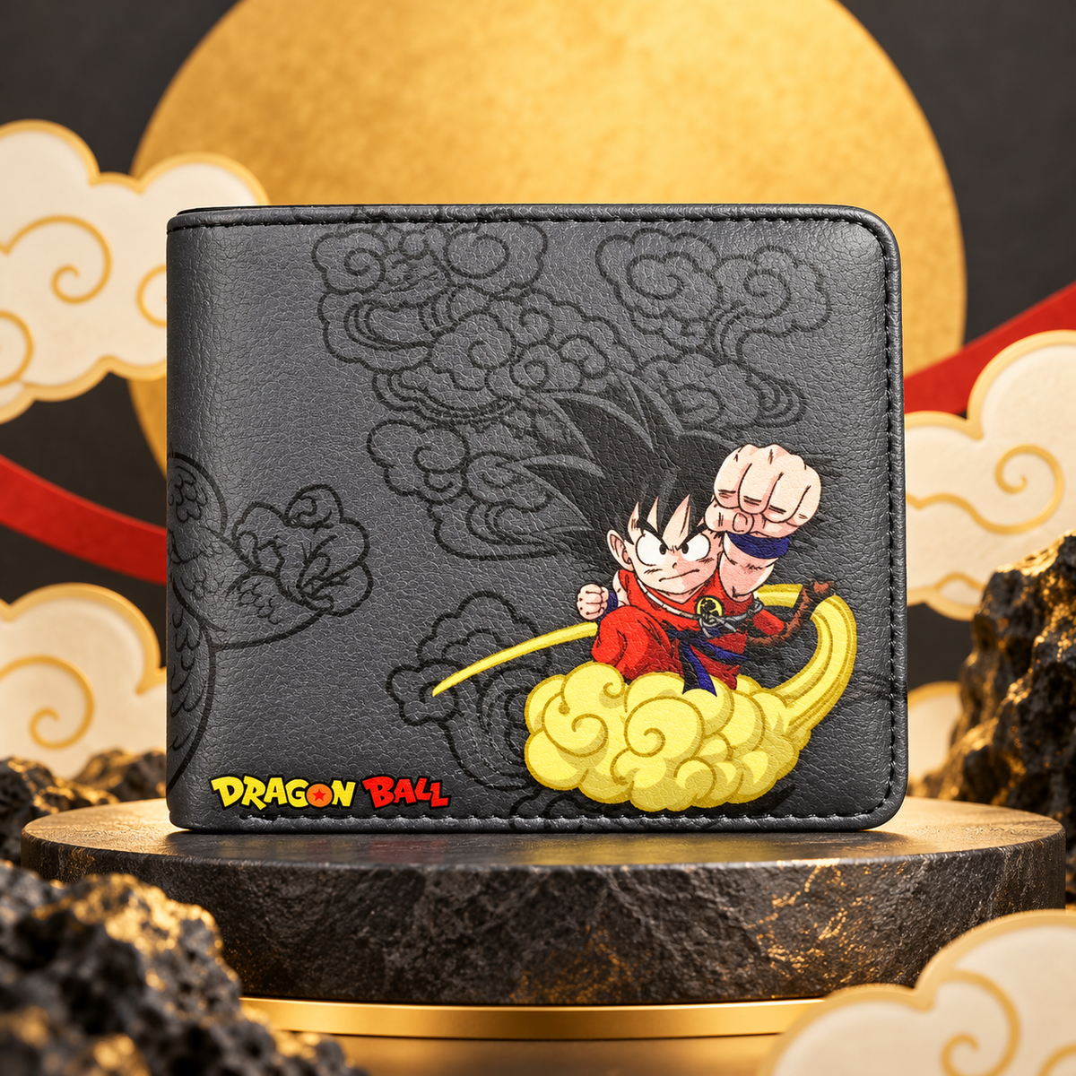 Goku Nimbus wallet front view on charcoal and gold cloud-inspired studio set
