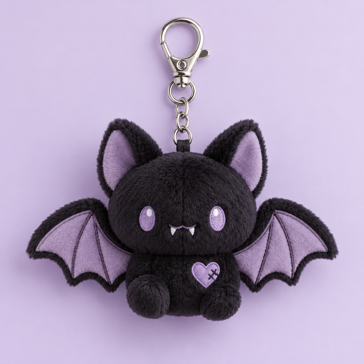 Black and lavender Yami Kawaii bat plush keychain with silver clasp
