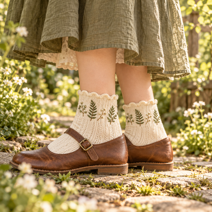 Cream fern-embroidered Mori Kei ankle socks styled with brown shoes and an olive skirt