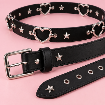 Close detail of heart chain belt, silver buckle, and star studs