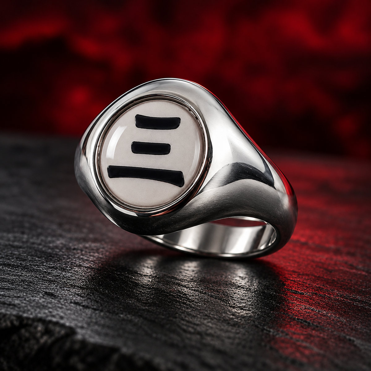 Three-quarter side view of the silver-tone Hidan San ring