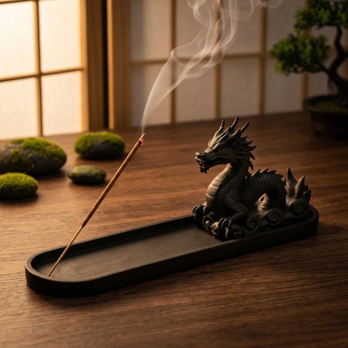 Japanese dragon incense holder on a warm wood table with curling smoke