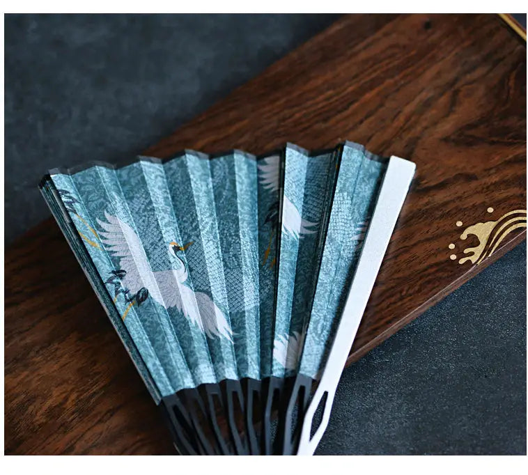 Abanico japonés con diseño de pájaros grulla