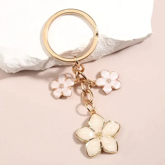 Portachiavi con fiori bianchi Sakura