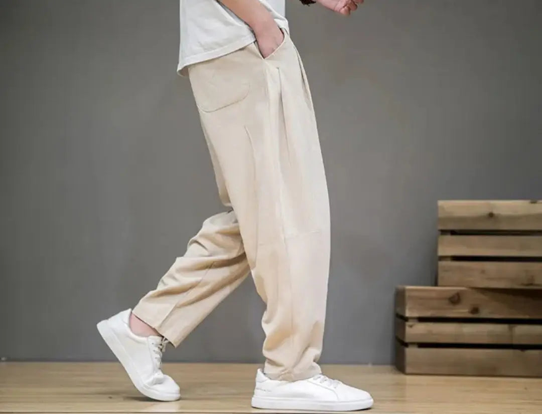Pantalones harén con cinturón de color liso