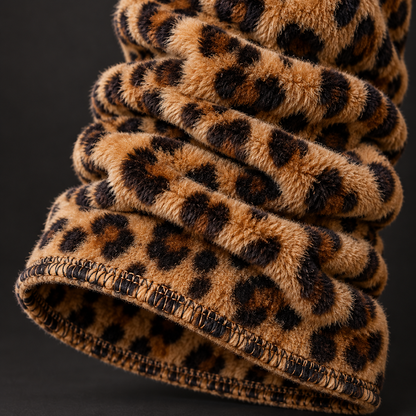 Close-up of plush leopard-print leg warmer texture and stitching