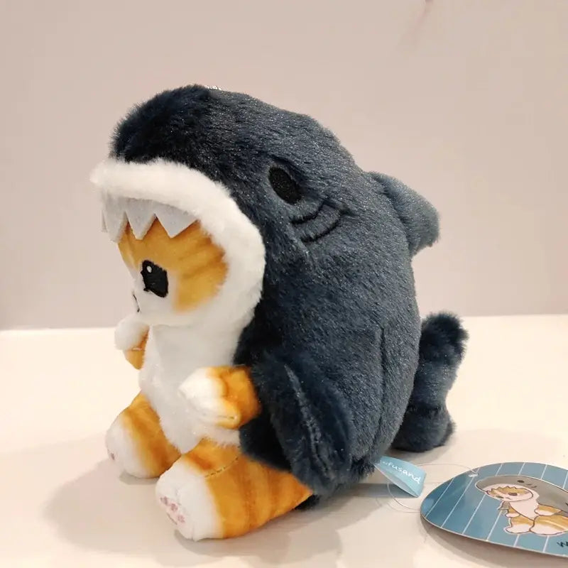 Adorable gatito tiburón peluche