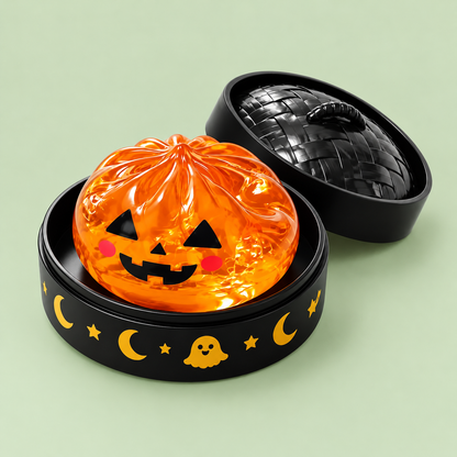 Pumpkin Halloween Dumpling Squishy on pale sage background