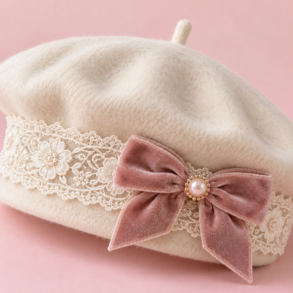 Close-up of ivory beret lace band and rose velvet bow