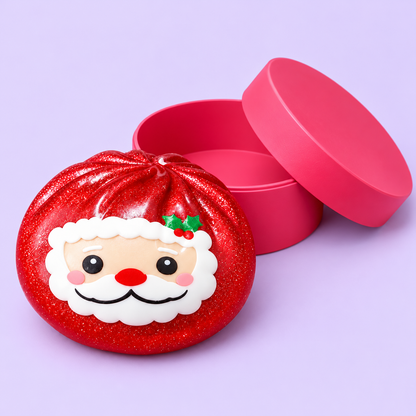 Red glitter Santa squishy shown outside its matching case