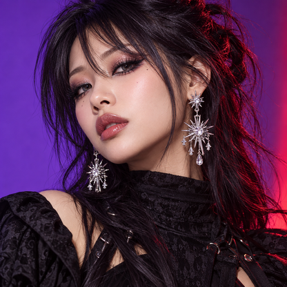 Starburst earrings styled with alternative Gyaru makeup and dark hair