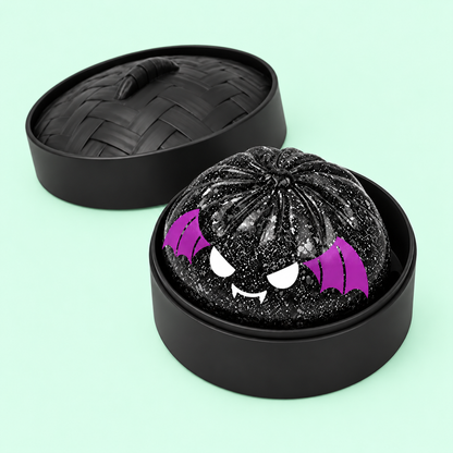 Spooky Bat Squishy open in its black case with ridged lid