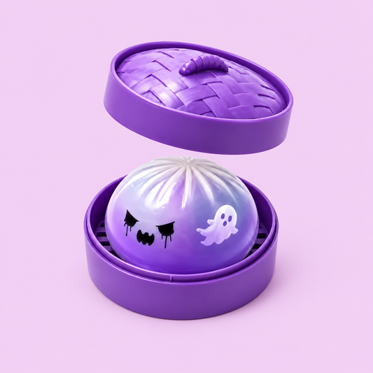 Spooky Ghost Dumpling Squishy in purple case on a plain pastel pink-lilac background