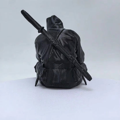 Thinking Ninja figure displayed on a white ledge