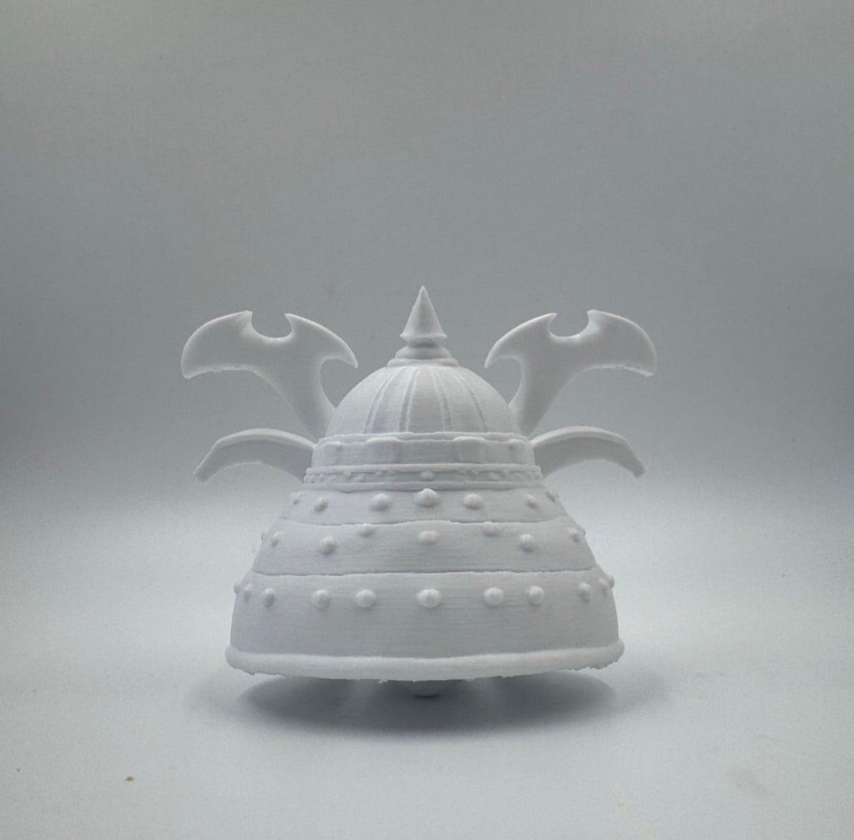 Side view of the white samurai helmet skull figure