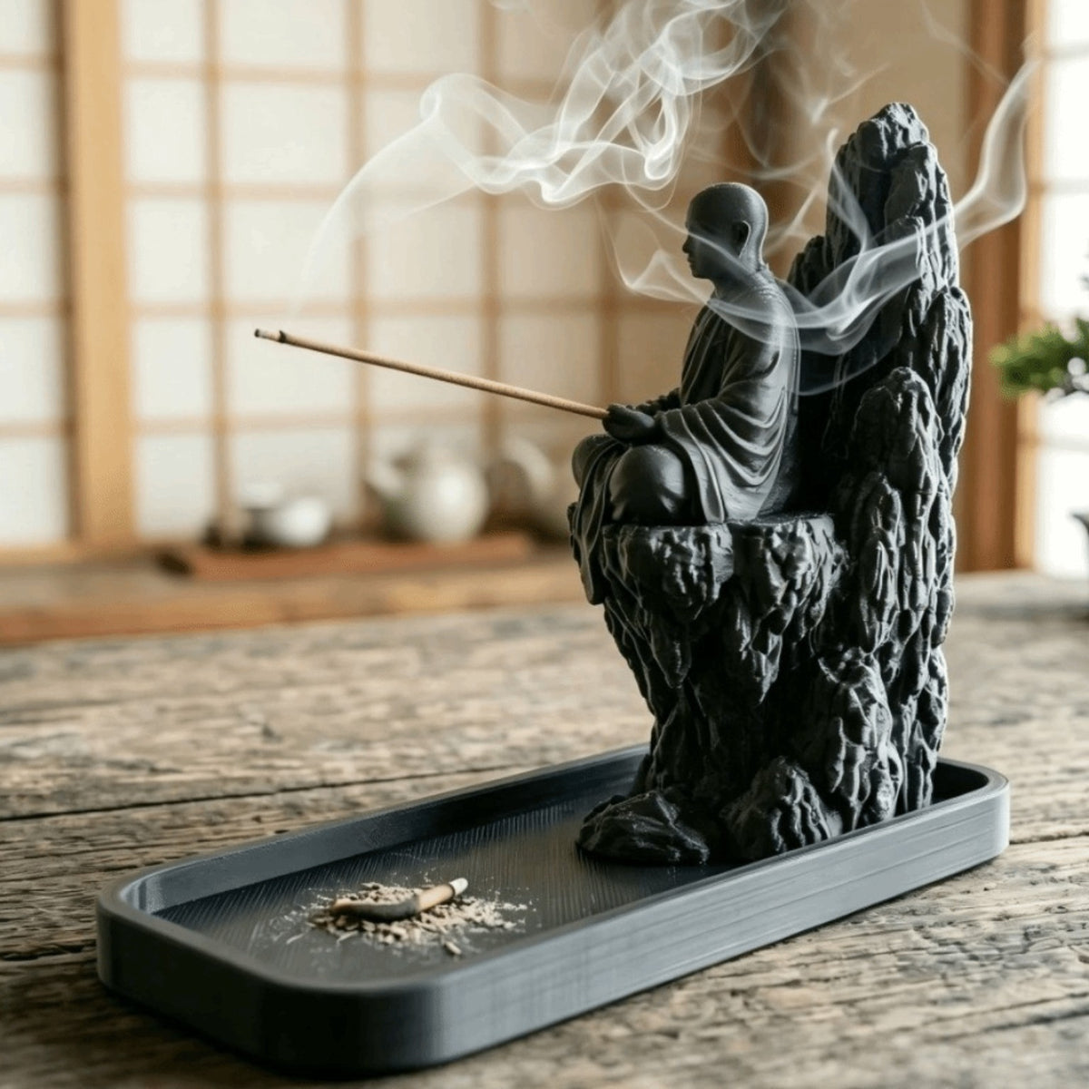 Zen monk incense holder in a tranquil Japanese-inspired setting